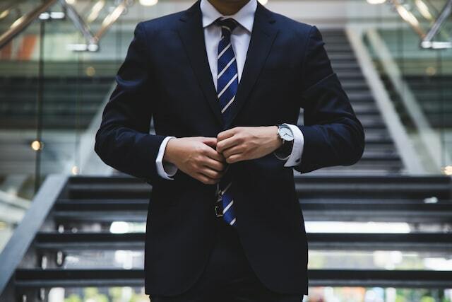 Man in suit preparing to take his job certification