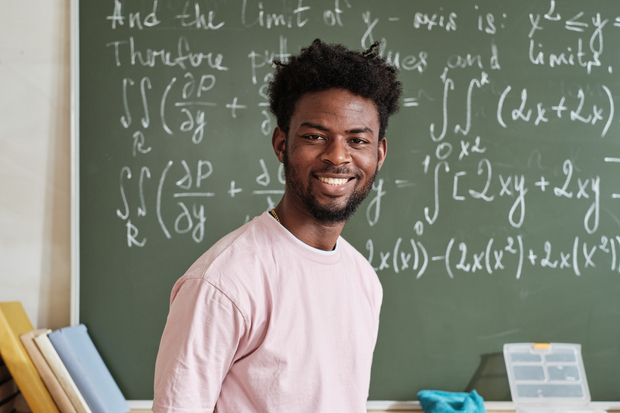 Young Mathematician correctly solves a problem on green board