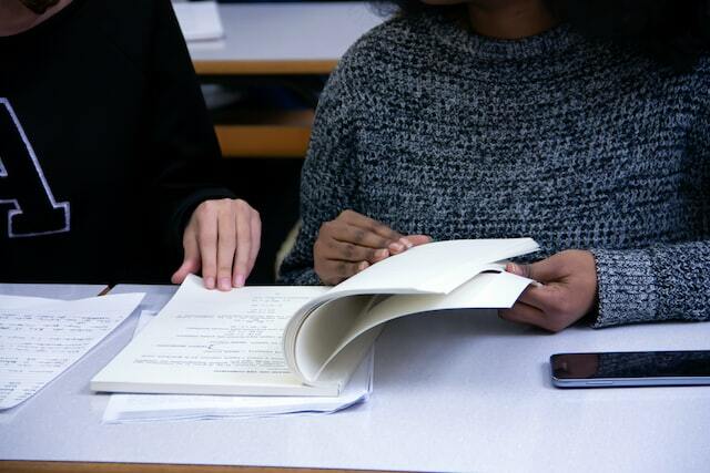 two people studying for job certification