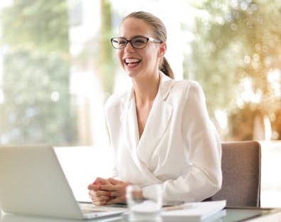 girl smiles taking career assessment