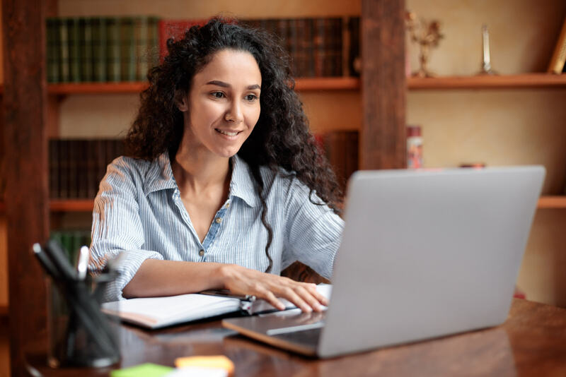 A job seeker searching for the best career assessment on a laptop