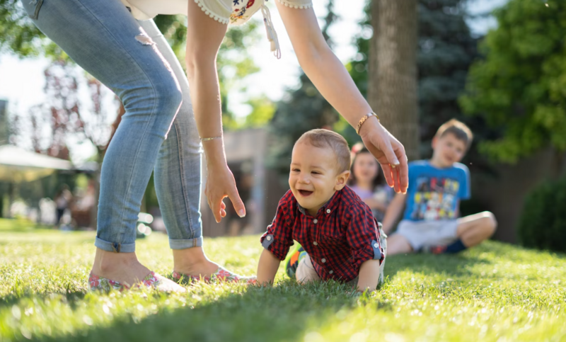 A college student is doing childcare to make extra money.