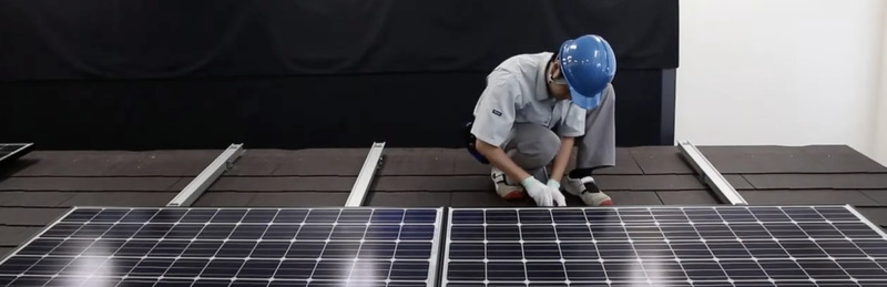 solar photovoltaic installer installing solar panels